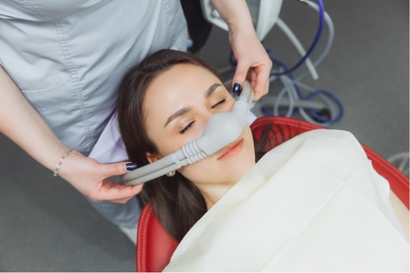 Woman receiving nitrous oxide dental sedation