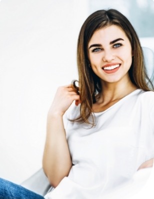 Woman with healthy smile thanks to preventive dentistry