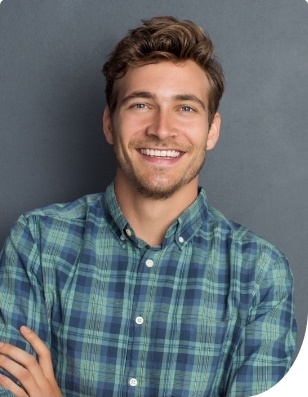 Man with flawless smile after cosmetic dentistry